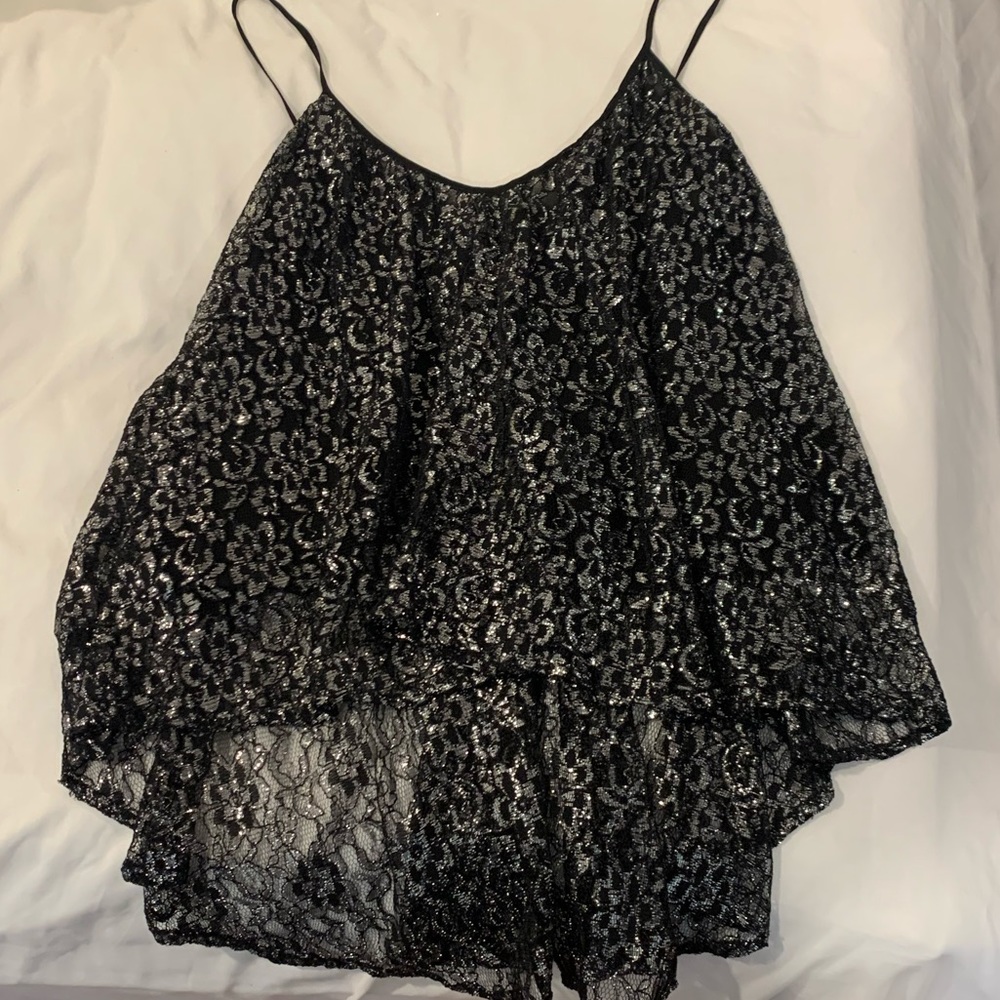 new silver and black glitter blouse but without the ticket